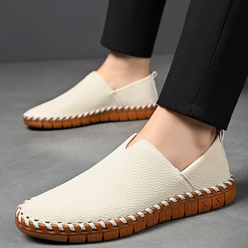SIZE 48 WHITE NON SLIP LOAFER =#81,000